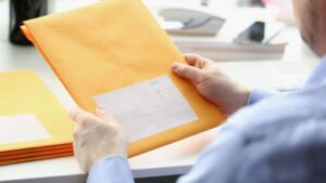 Close up of tax forms in an envelope